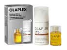 Olaplex Endless Shine Smooth Hair Set including the gray retail box, a white Bond Smoother bottle, and two Bonding Oil bottles with golden-yellow liquid, all on a white background.