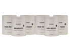 Six white cylindrical supplement containers labeled GLOWWA Hair Food arranged in two rows against a plain white background.
